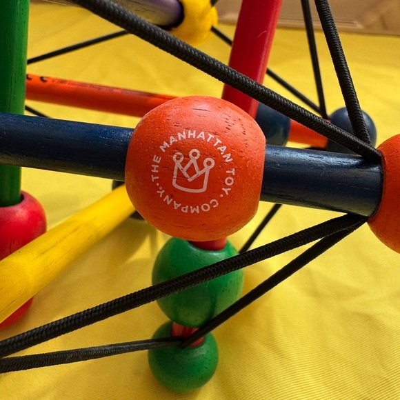 🌈 Manhattan Toy Company Skwish Classic Wooden Rattle & Teether Baby Toy - Picture 3 of 4